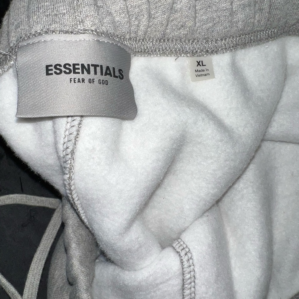 Fear of God sweats in Heather Oatmeal (Essentials)